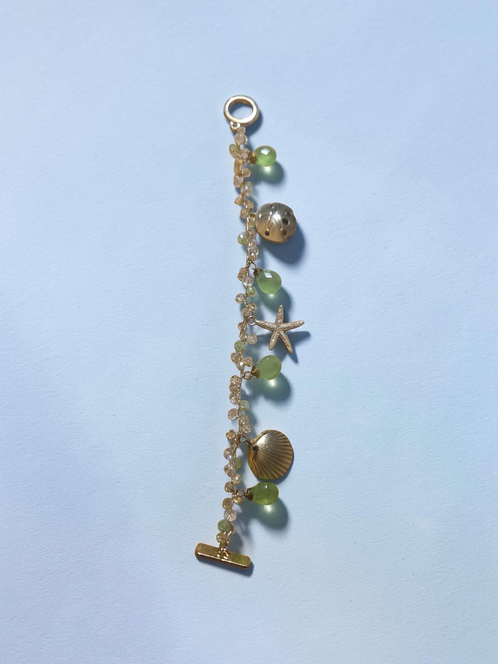 Gold Coastal Charm Bracelet with Green Beads